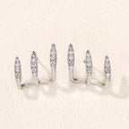 Boucles d'oreilles élégantes avec strass à trois griffes