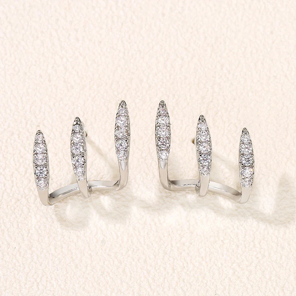 Boucles d'oreilles élégantes avec strass à trois griffes