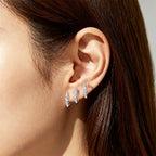 Boucles d'oreilles élégantes avec strass à trois griffes