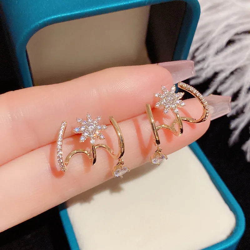 Boucles d'oreilles griffes scintillantes pour femme