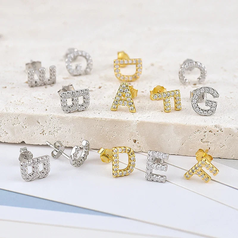 Boucles d'oreilles initiale 