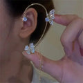 Boucles d'oreilles papillon et zircons