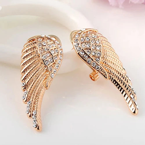 Boucles d'oreilles pendantes ailes d'ange avec strass or
