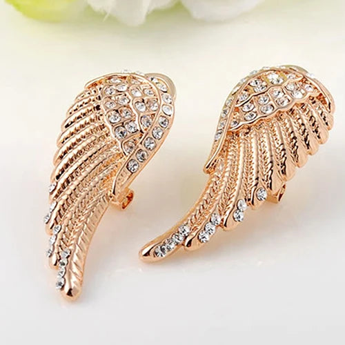 Boucles d'oreilles pendantes ailes d'ange avec strass or