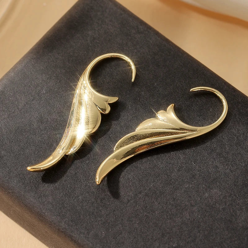 Boucles d'oreilles pendantes ailes d'ange femme or