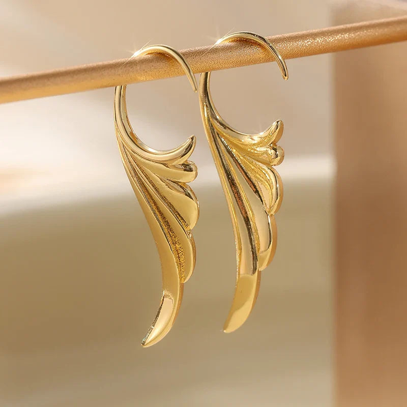 Boucles d'oreilles pendantes ailes d'ange femme or