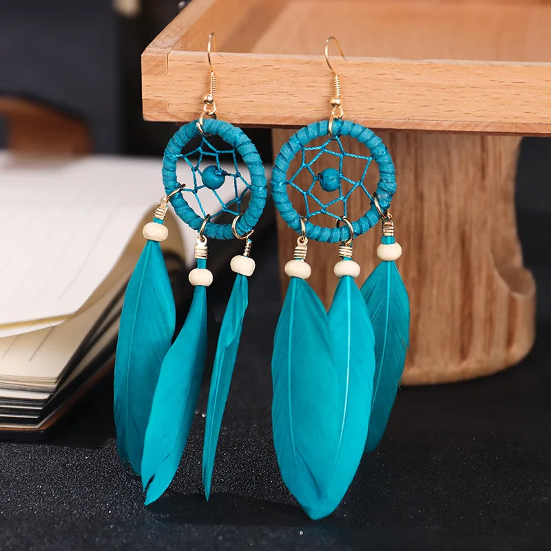 Boucles d'Oreilles Pendantes Attrape-Rêves et Plumes bleu