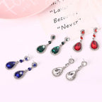 Drop earrings with large sparkling teardrop crystal