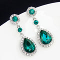 Drop earrings with large sparkling green teardrop crystal