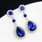 Drop earrings with large sparkling blue teardrop crystal