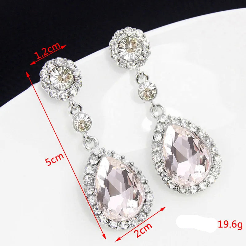 Drop earrings with large sparkling teardrop crystal
