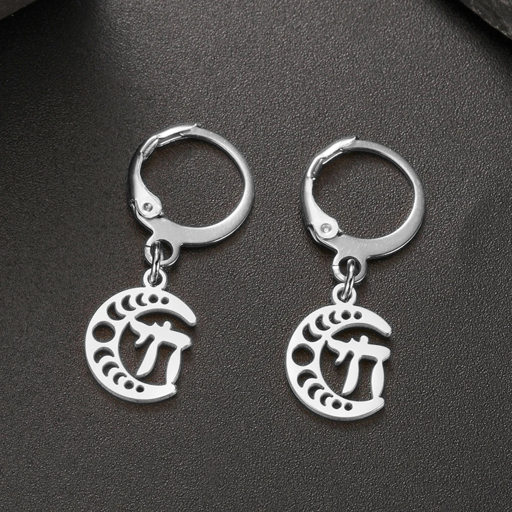Dangling earrings with the Chai life symbol on a silver crescent moon