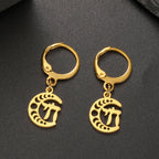Dangling earrings with the Chai life symbol on a gold crescent moon