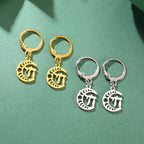 Dangling earrings with the Chai life symbol on a gold crescent moon