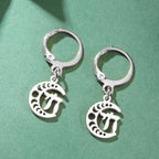 Dangling earrings with the Chai life symbol on a silver crescent moon