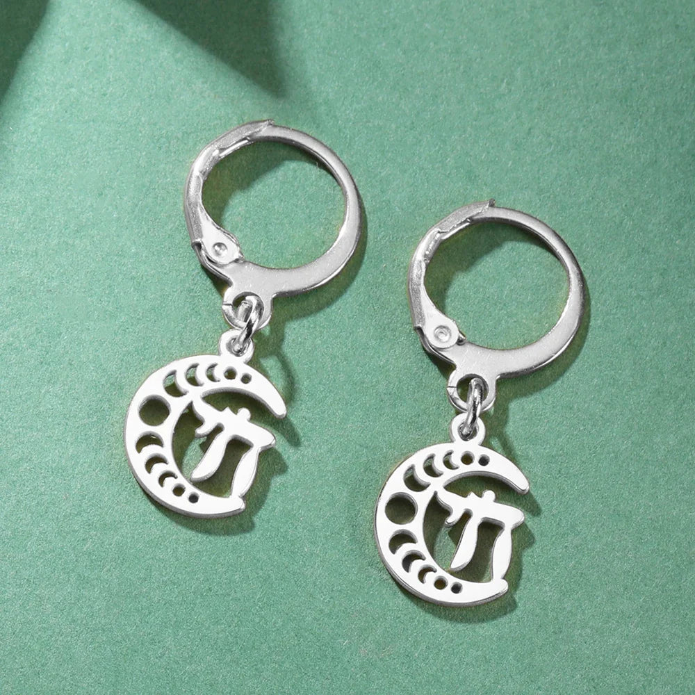 Dangling earrings with the Chai life symbol on a silver crescent moon