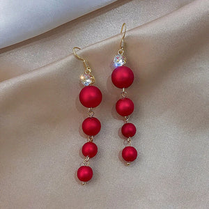 Boucles d'Oreilles Pendantes Boules de Noël Rouges Femme