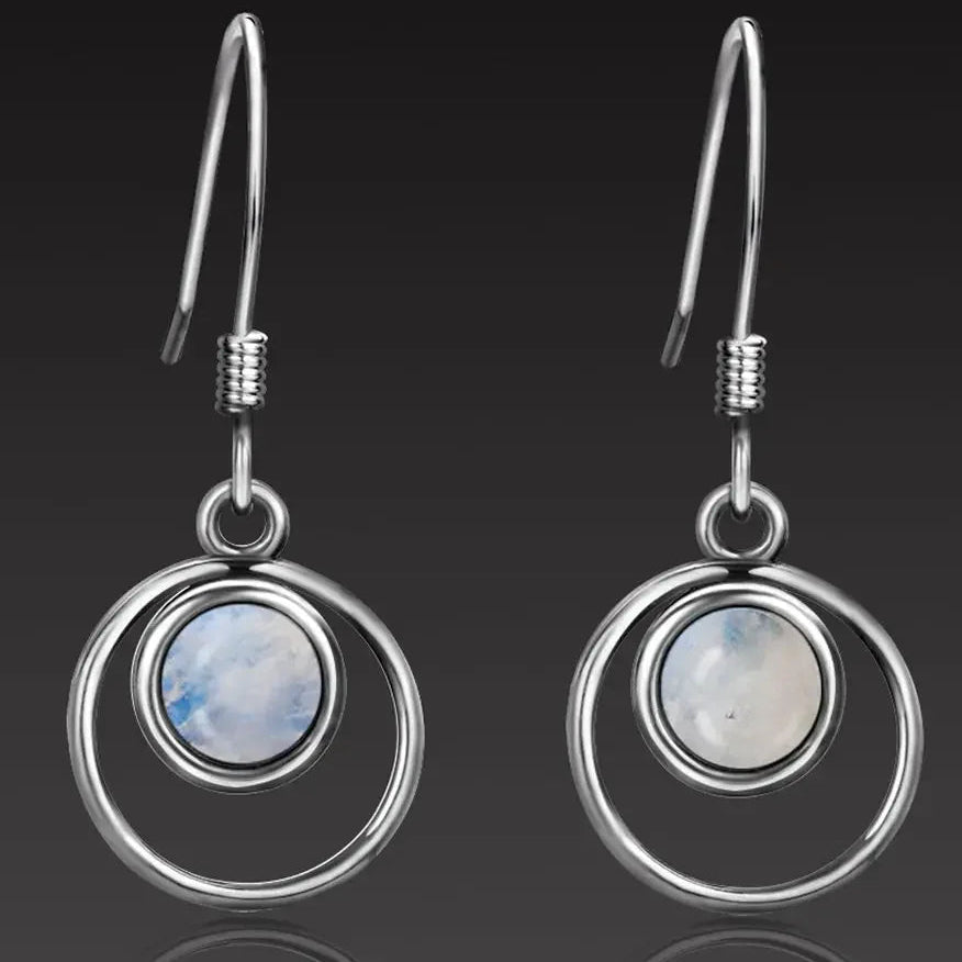Boucles d'oreilles pendantes cercle entrelacé et pierre de lune