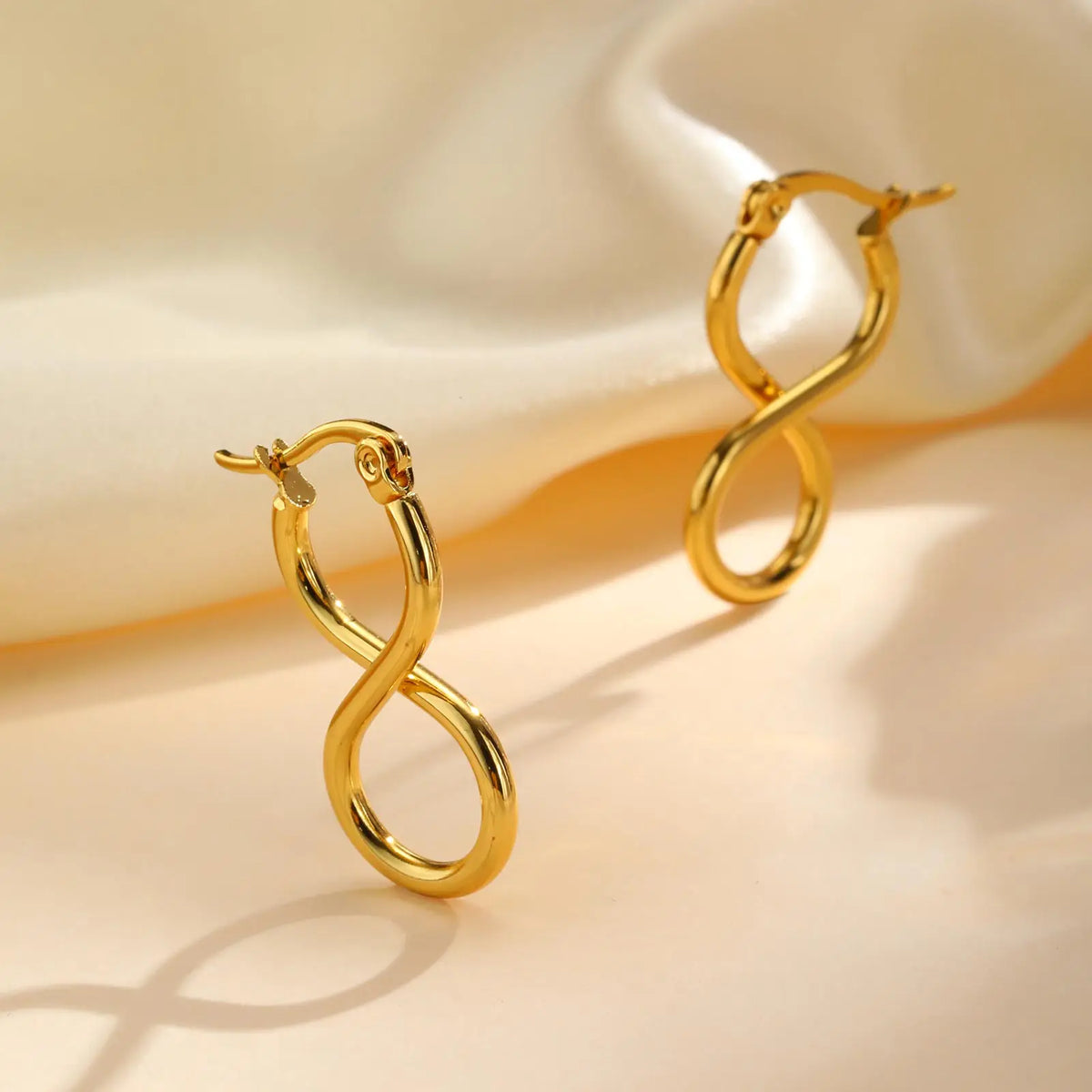 Boucles d'oreilles pendantes symbole infini géométrique 