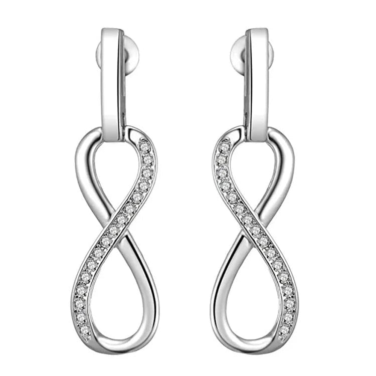 Boucles d'oreilles pendantes symbole infini orné de strass