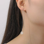 Orecchini pendenti lunghi con la <span data-glossary-id="etoile-de-david">stella di David</span> simbolo ebraico argento