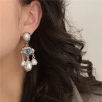 Boucles d'Oreilles Pendantes Oeil Bleu et Perles argent