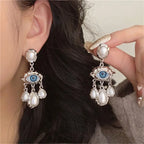 Boucles d'Oreilles Pendantes Oeil Bleu et Perles argent