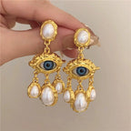 Boucles d'Oreilles Pendantes Oeil Bleu et Perles or