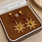 Boucles d'oreilles pendantes soleil et pierre d'oeil de tigre