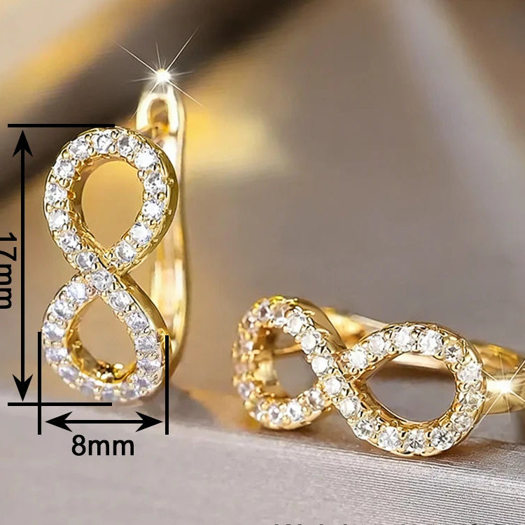 Boucles d'oreilles pendantes symbole infini scintillant