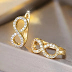 Boucles d'oreilles pendantes symbole infini scintillant or