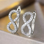 Boucles d'oreilles pendantes symbole infini scintillant argent