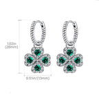 Twisted drop earrings with four-leaf clover