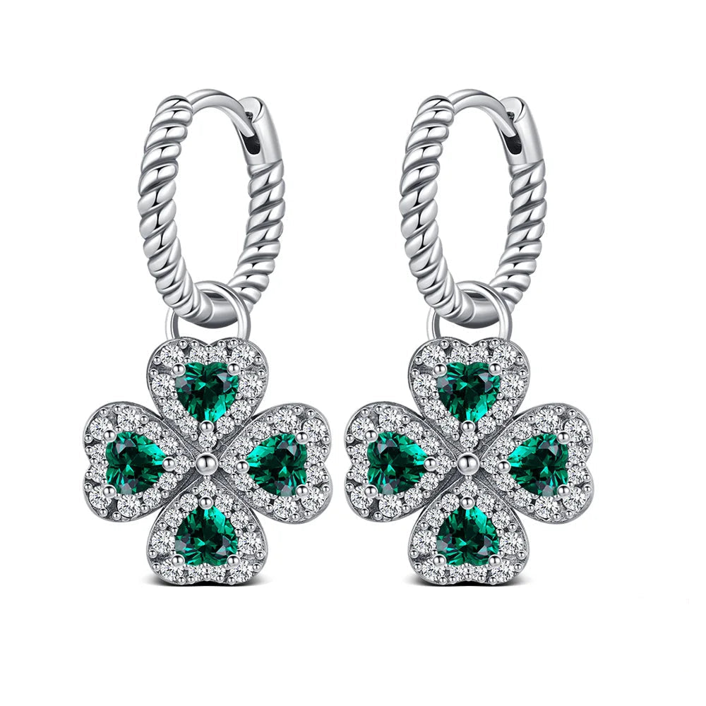 Twisted drop earrings with four-leaf clover
