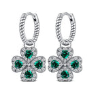 Twisted drop earrings with four-leaf clover