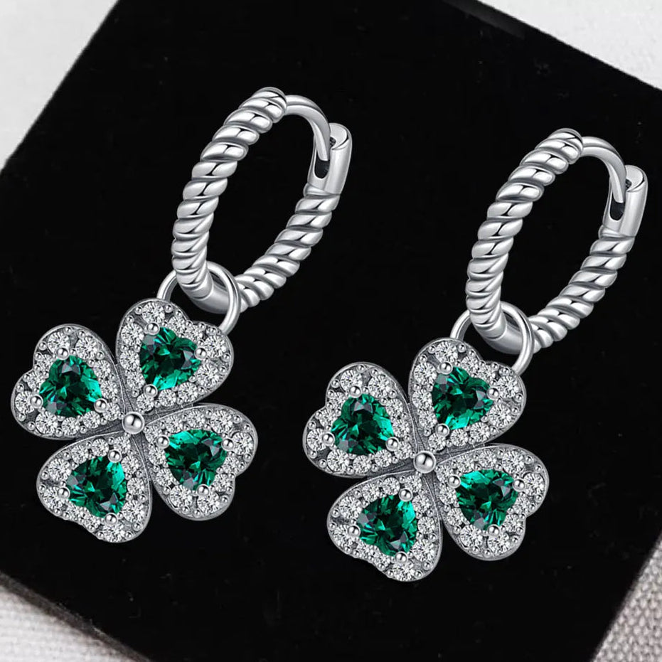 Twisted drop earrings with four-leaf clover