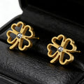 Four-leaf clover earrings with four openwork hearts