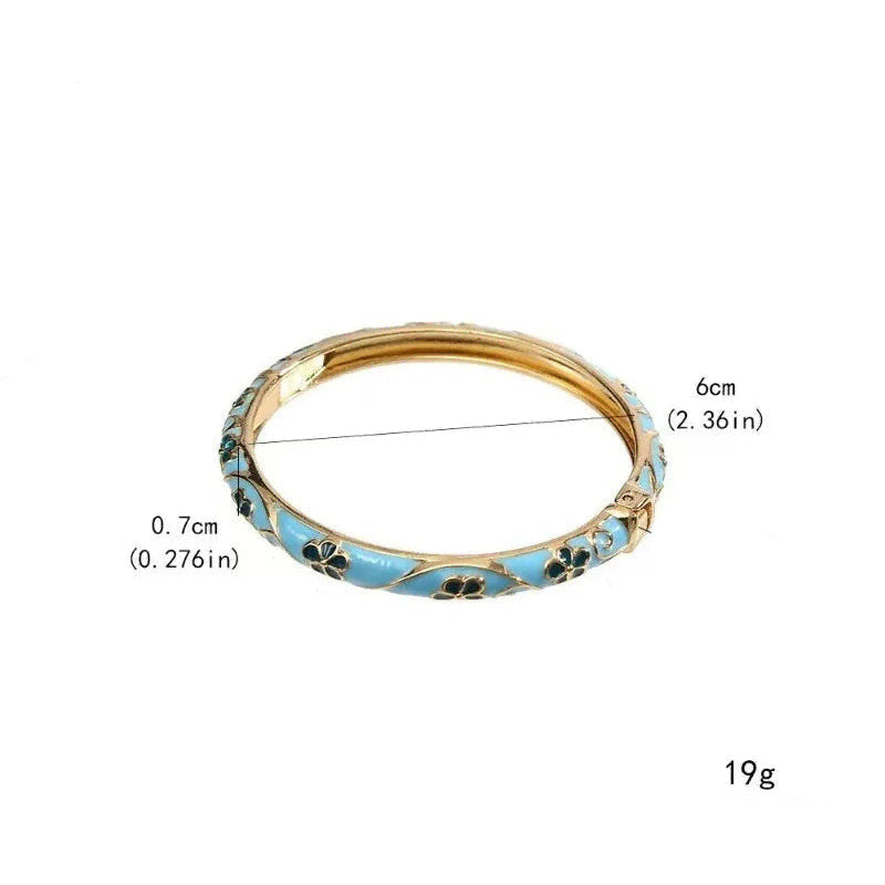 Bracelet à motifs fleurs et feuillages en émail coloré