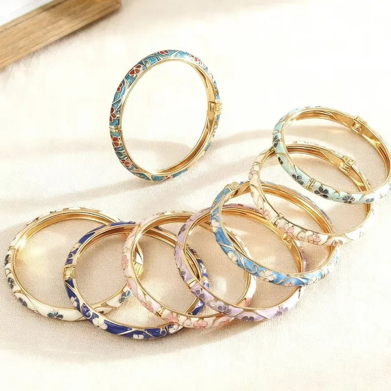 Bracelet à motifs fleurs et feuillages en émail coloré bleu foncé
