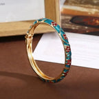 Bracelet à motifs fleurs et feuillages en émail coloré vert d'eau