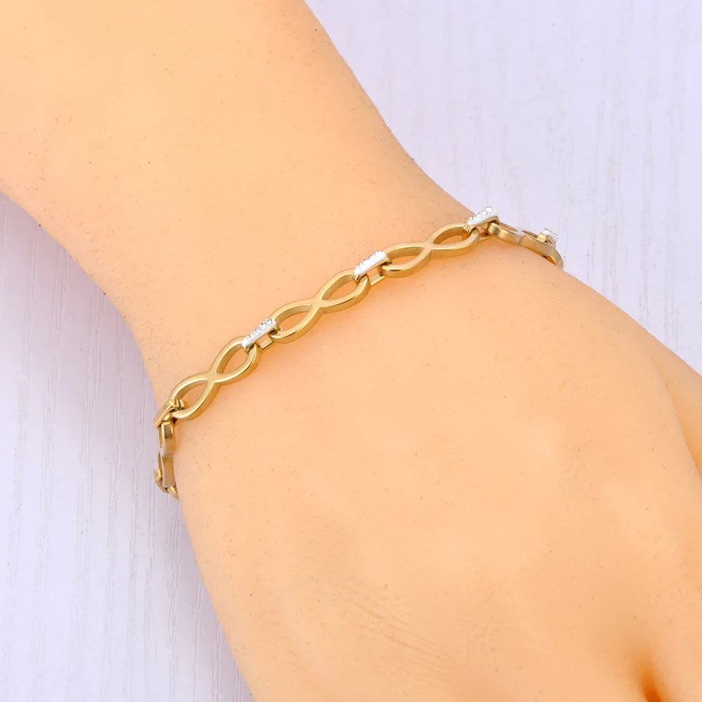 Bracelet avec symboles infini entrelacés or