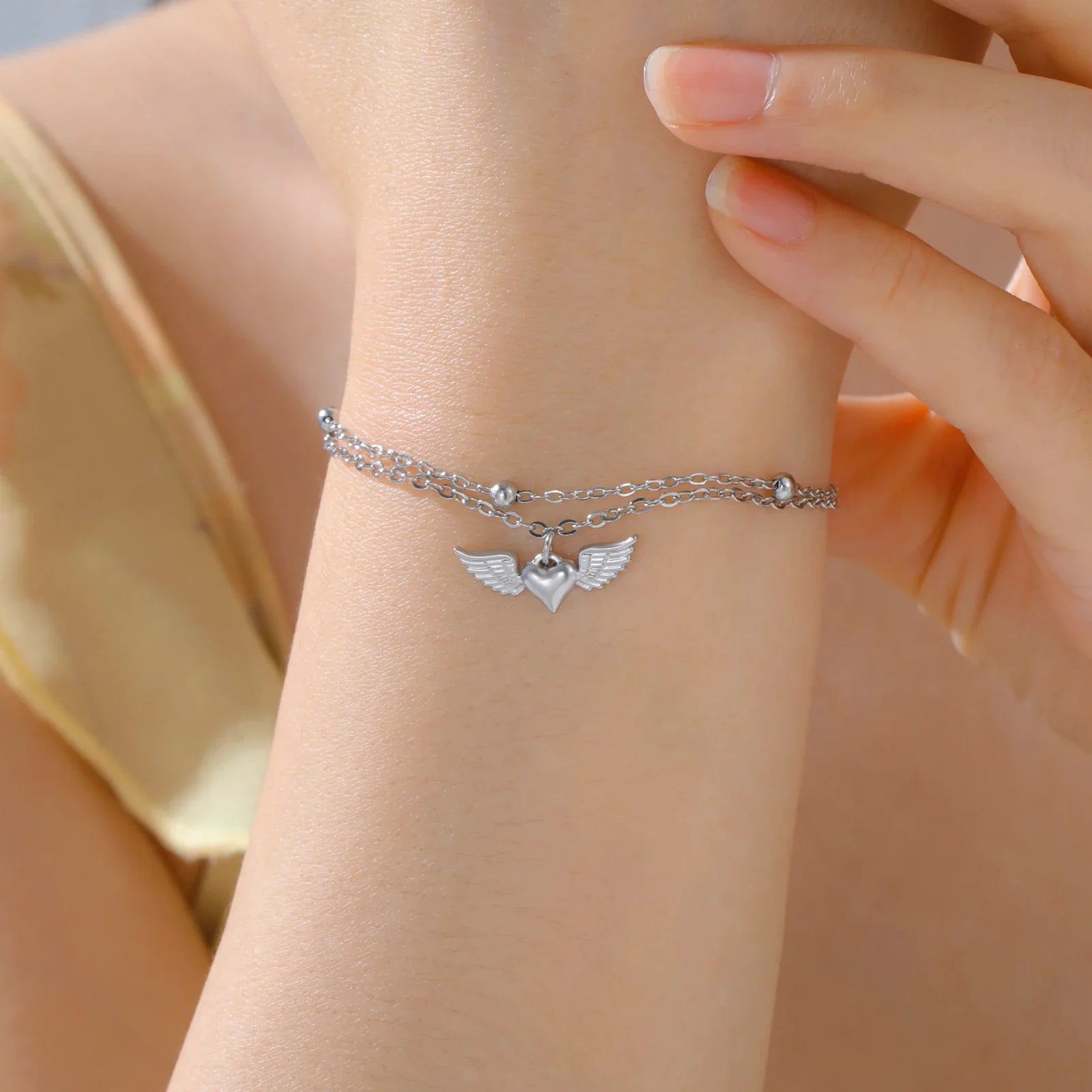Bracelet ajustable ailes d'ange argent