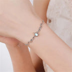 Adjustable bracelet with moonstone drop