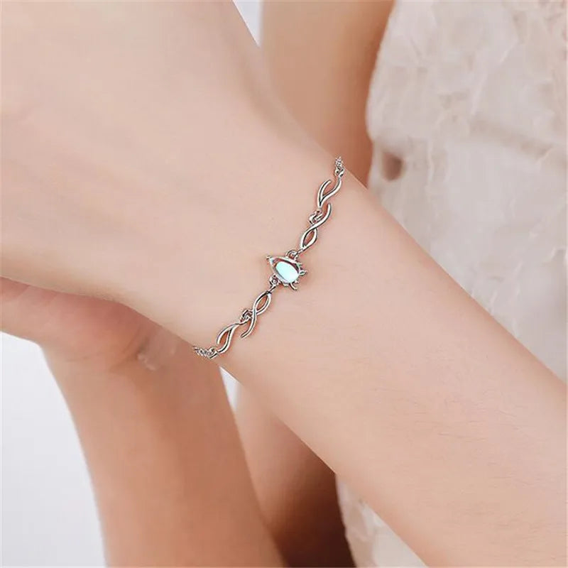 Adjustable bracelet with moonstone drop