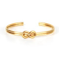 Bracciale regolabile con nodo per uomo oro