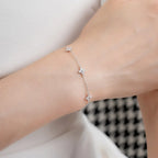 Justerbart kløverarmbånd med strass 