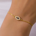 Bracelet ajustable oeil bleu orné de strass