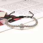 Perlen-Kordelarmband mit Totenkopf aus mystischen Strasssteinen in Silber