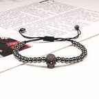 Perlen-Kordelarmband mit Totenkopf aus mystischen Strasssteinen in Schwarz