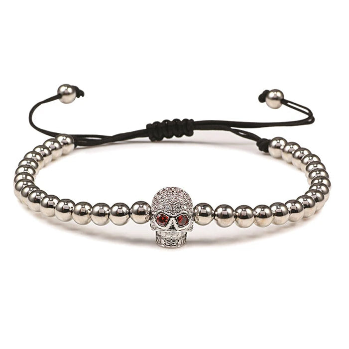 Pulseira de cordão com contas e caveira em strass místico prateado